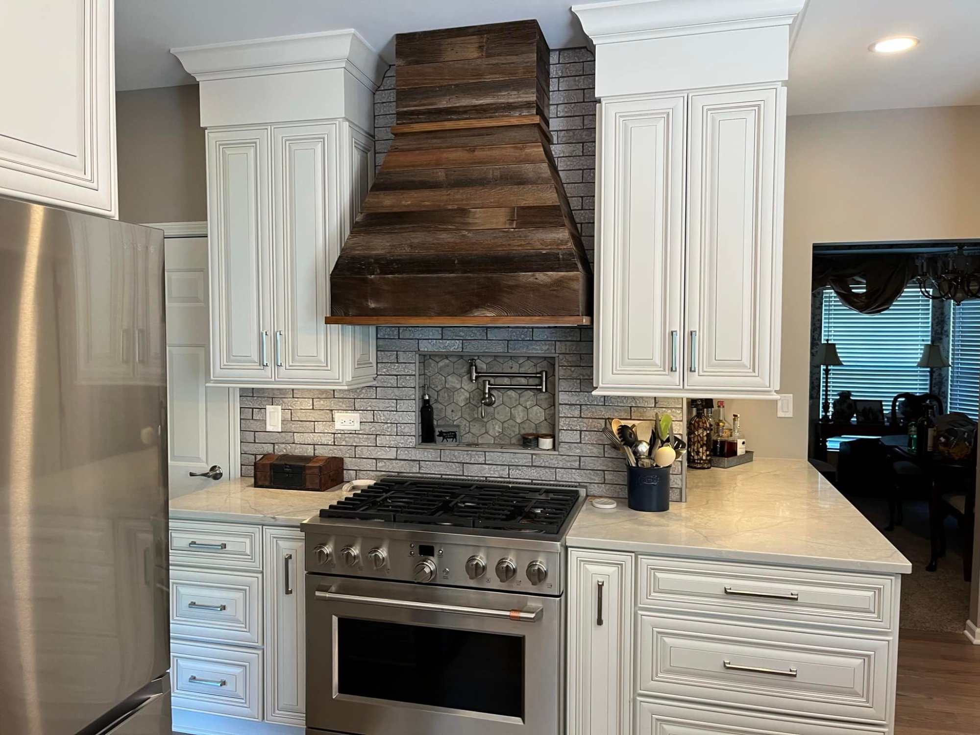 Custom reclaimed wood range hood – Private Residence